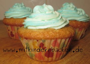 Cupcakes mit blauem Topping