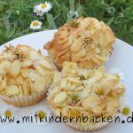 Muffins mit Mandeln und Gänseblümchen